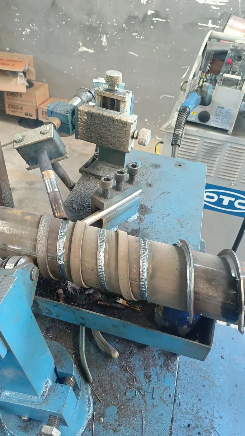 Semi-automatic steel strip welding machine – problems with welding the threaded steel strip need to be debugged and resolved by Alexander and Xiaoshu Li.
